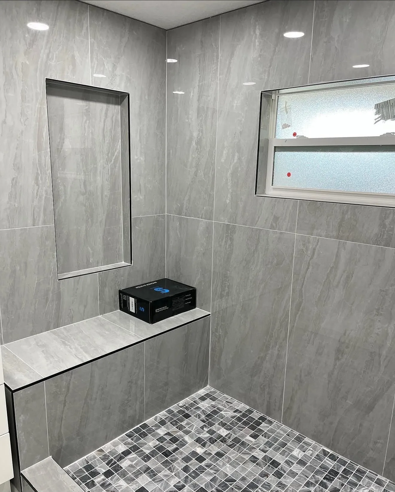 Walk-In Shower with Built-In Bench — Bathroom Tile Installation in Central Florida