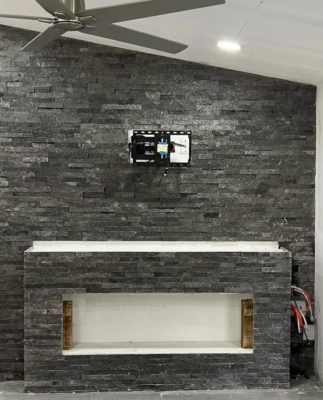 Feature Walls — stacked stone fireplace wall